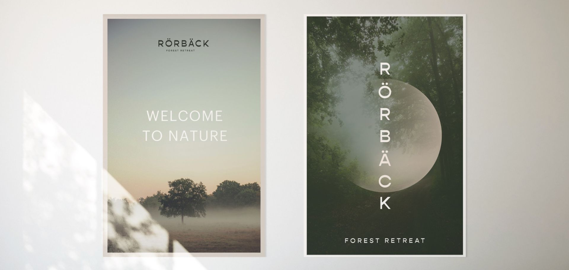  Två stilrena posters för Rörbäck Forest Retreat som visar varumärkets grafiska profil med dimmiga naturbilder och minimalistisk typografi.